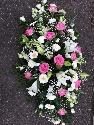 Pink and white coffin spray