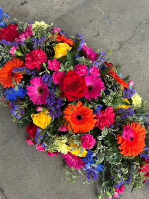 Vibrant coffin spray