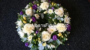 Loose wreath inc white roses