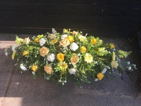 Yellow and peach Coffin spray