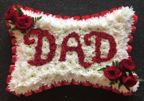 Dad in red flowers on a pillow