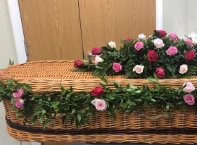 Pink rose coffin spray and Garland