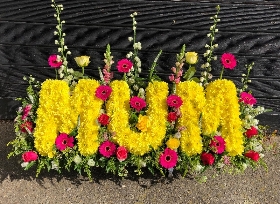 Mum in a garden of flowers