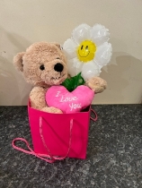 Bear with pink heart and balloon