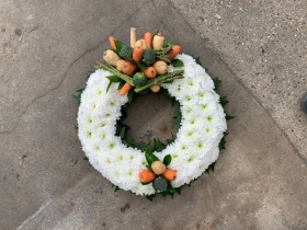 Wreath with vegetable spray